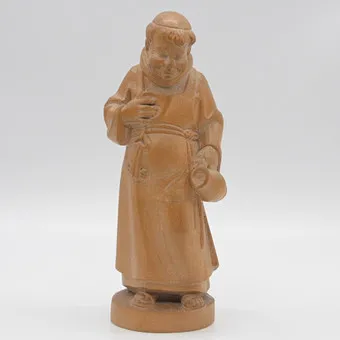 ALOIS OHMAYER. MONK, HAND-CARVED FIGURE, FOR NEBELHORN HOLZSCHNITZEREI, OBERSTDORF / ALLGÄU, CIRCA 1990S, WITH STUDIO LABEL.