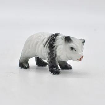 SCULPTURE, PANDA, PORCELAINE, PEINTE À LA MAIN, DÉBUT DU 20E SIÈCLE.