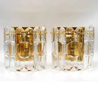 Julius Theodor Kalmar (1884-1968). 'Palazzo', a pair of pendant lamps with pull switch, gilded brass with ice glass panels, Austria, circa 1970s.