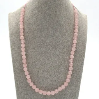 Collier de perles en quartz rose, perles polies, fermoir cordon ajustable, 20e siècle, env. 55 cm.