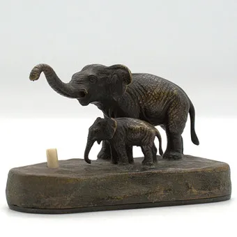 Antique bronze table bell with two sculpted elephants, circa 1900.