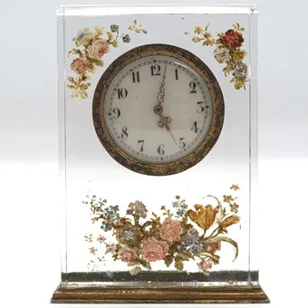 Miniature de pendule de table ancienne, verre avec peinture florale en émail, décorations en bronze, Autriche fin 19e siècle.