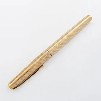 PELIKAN, FOUNTAIN PEN, 18 KARAT YELLOW GOLD NIB, ROLLED GOLD, WITH DEDICATION FROM 1982, GERMANY.