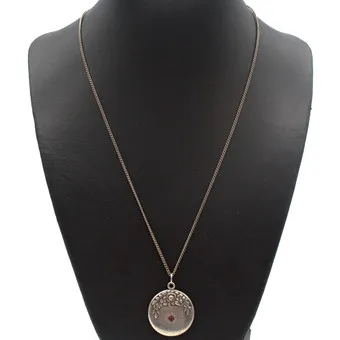 ART NOUVEAU ROUND 800 SILVER NECKLACE PENDANT SET WITH A RED STONE, HALLMARKED, CIRCA 1900, ON SILVER CHAIN.