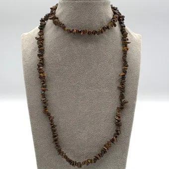 LANG COLLIER, TIJGEROOG, 20E EEUW, CA. 82 CM.