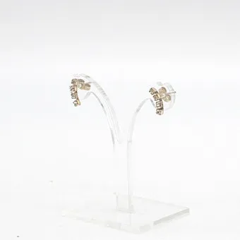 JENS AAGAARD. DESIGNER EARRINGS, 830 SILVER WITH ZIRCONIA, CURVED FORM, VINTAGE.