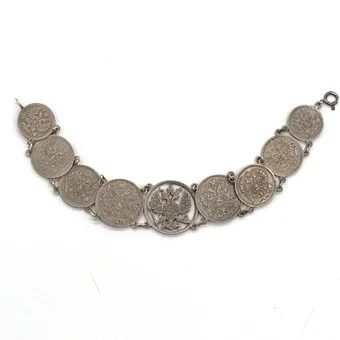ANTIKES RUSSISCHES MÜNZ SILBER ARMBAND, MITTIG DOPPELKOPFADLER, HANDARBEIT, RUSSLAND UM CA. 1914.