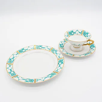 One plate and one cup with saucer in porcelain by Zeh Scherzer Bavaria, motif: turquoise patterns and gold rims, Art Deco, hand-painted.