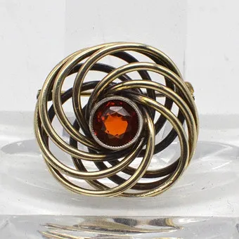 ORESTO, vintage broche uit de jaren 1940, gedraaide draden met een gekleurde steen, verguld, handgemaakt.