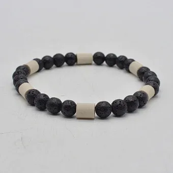 VINTAGE COLLIER MIT LAVASTEINPERLEN, KERAMIKTRENNPERLEN, AM FLEXBAND, CA. 30 CM.
