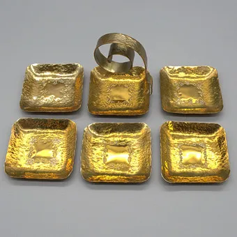 Designer bowl set, unknown manufacturer, six pieces, gold-plated brass, hand-raised, Germany, circa 1950.