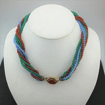 Collier avec perles de verre, argent 800 doré et cabochon de cornaline, multi-rangs, vers 1930.