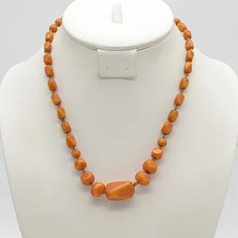 LIGHT BROWN BAKELITE NECKLACE, FACETED BEADS, BROWN THREAD, HANDMADE, ENDLESS, CIRCA 1920S.