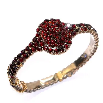 Antique garnet bangle tombac and 12.48 ct Bohemian garnets (144 stones) circa 1860.