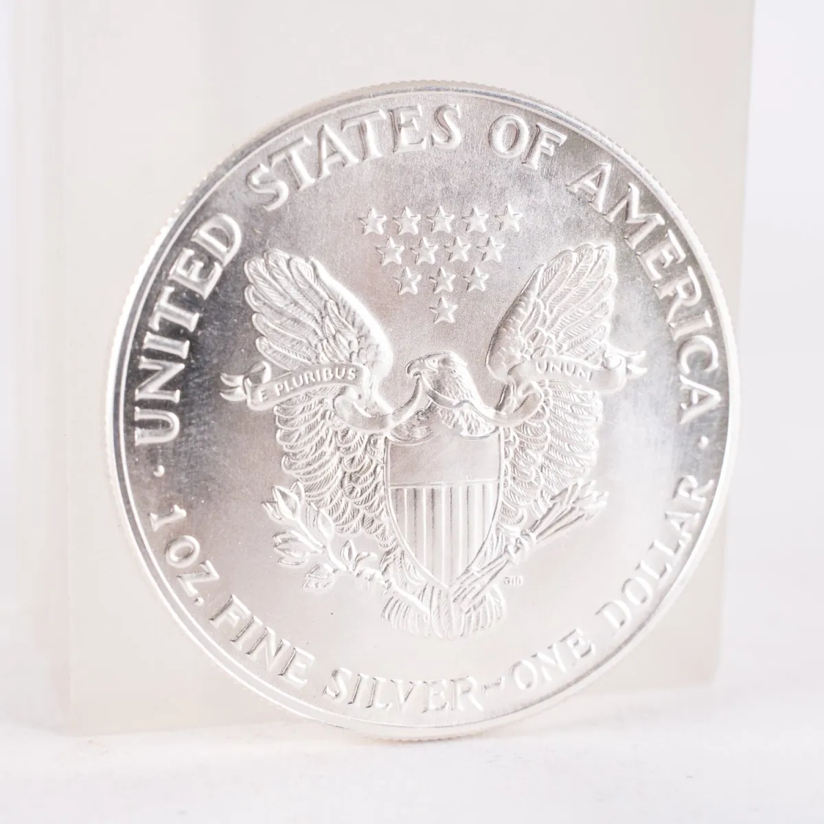 1 oz / Argent fin - One Dollar, réplique / réimpression datée 1897.