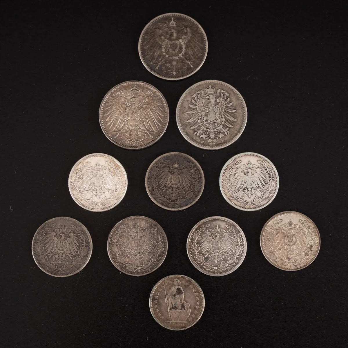 10-teilige Münzsammlung Kaiserreich, bestehend aus: 3x1 Mark (1875 / 1901 / 1915) und 7x1/2 Mark (1905 / 1907 / 1913 / 1…