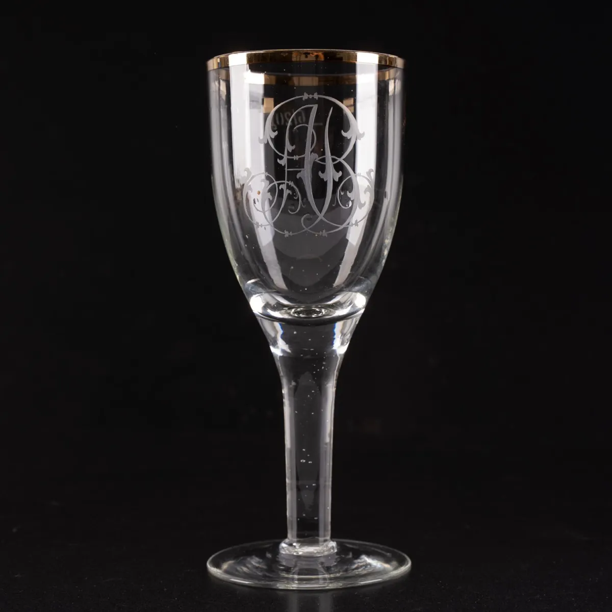 Verre à pied, 19e/20e siècle, verre incolore, jambe avec d'innombrables inclusions de bulles d'air, monogramme gravé...