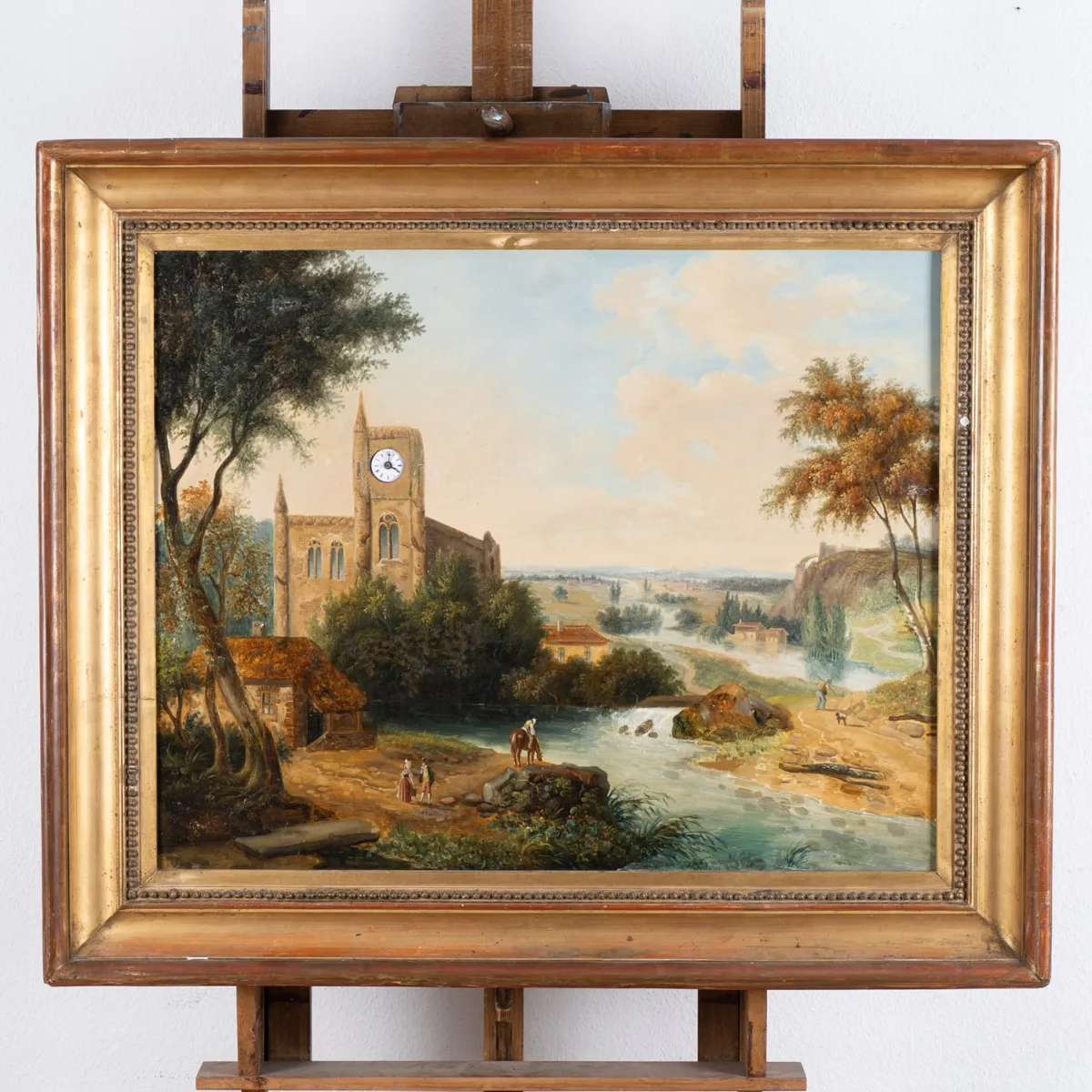 Large picture clock, Biedermeier around 1839 / 40, in the foreground monastery church with tower and figures, on the riverbank with...