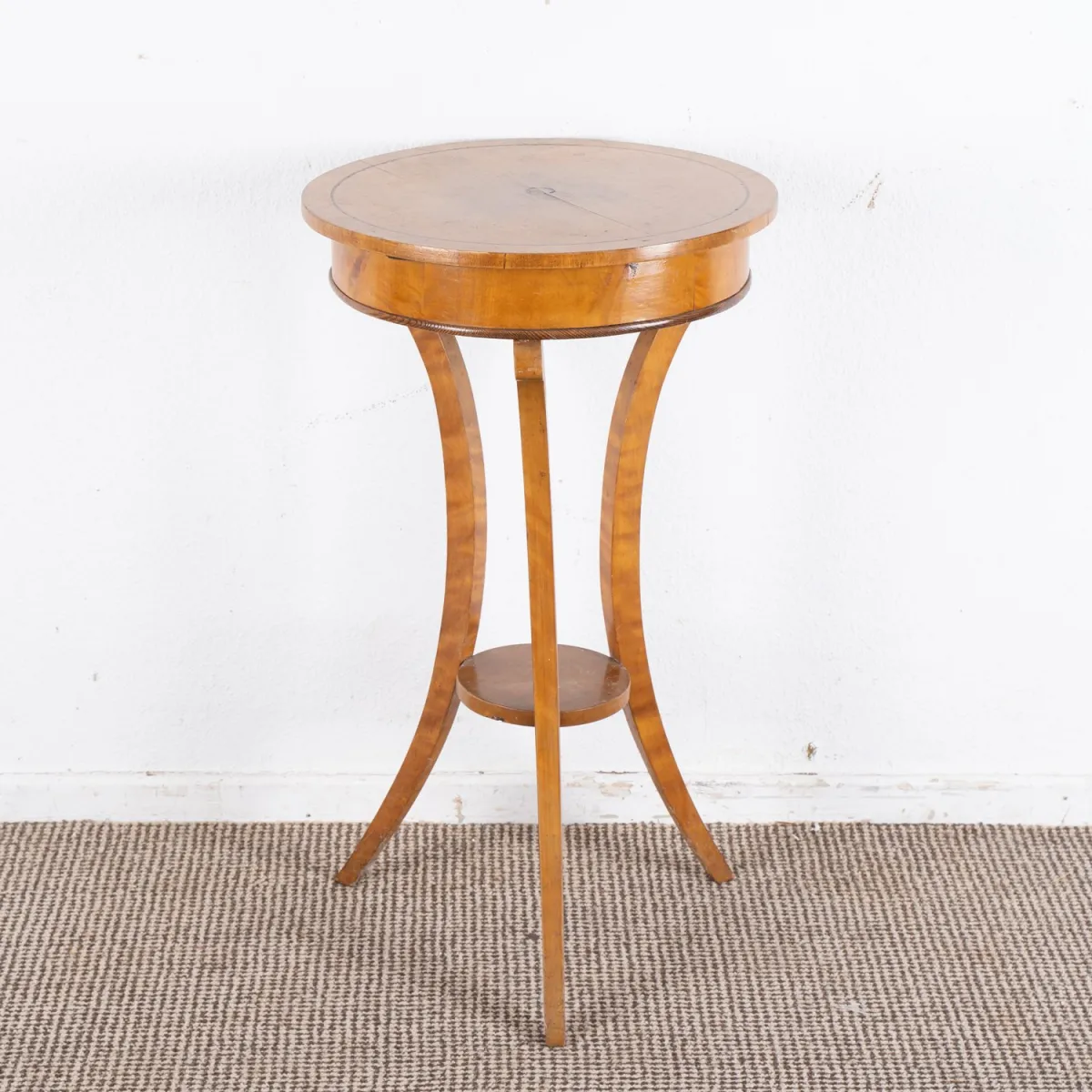 Round side table, Biedermeier circa 1900/20, solid and veneered birch, tabletop with blackened line decor, go…