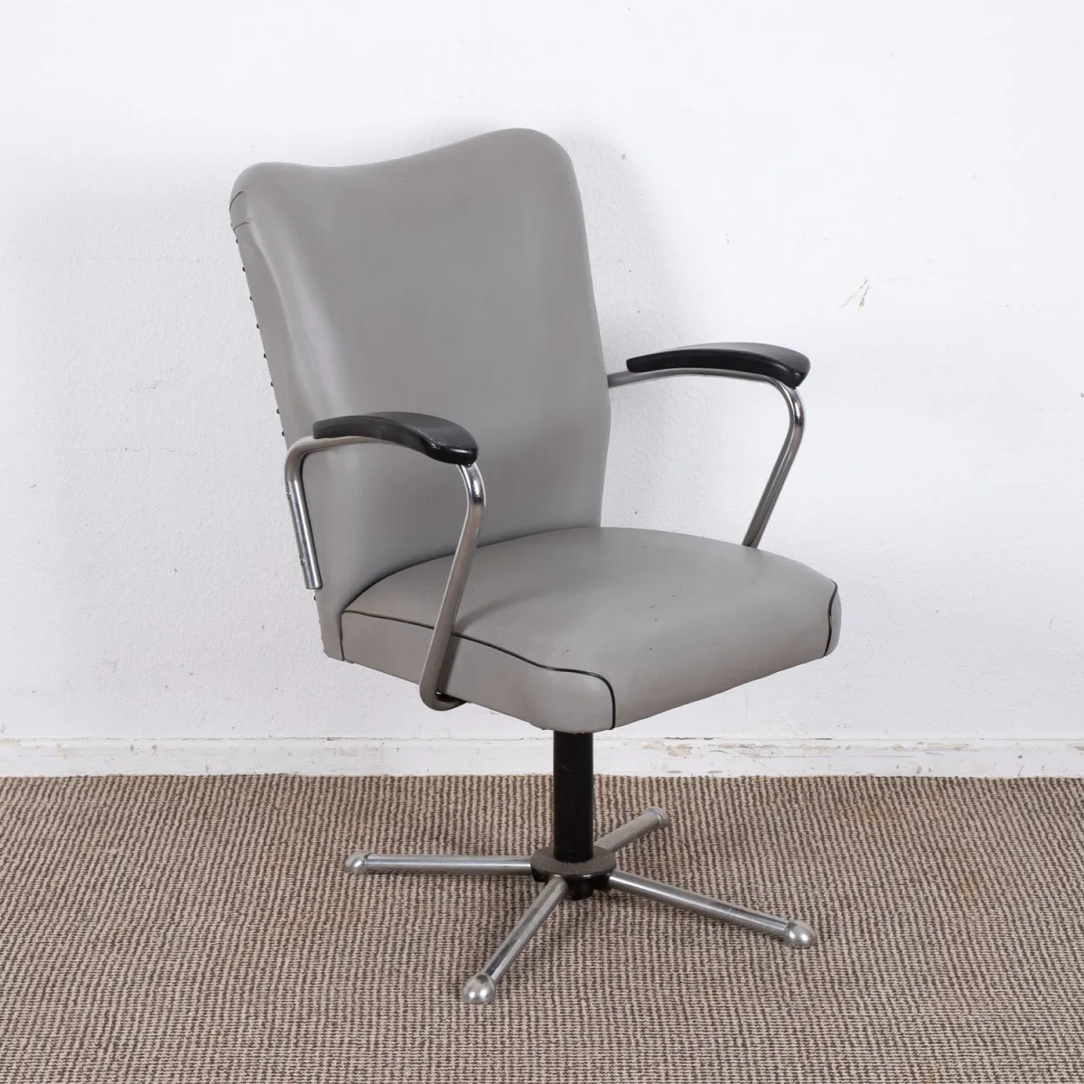Swivel chair from a doctor's practice, 1960s, grey faux leather, chrome armrests and base