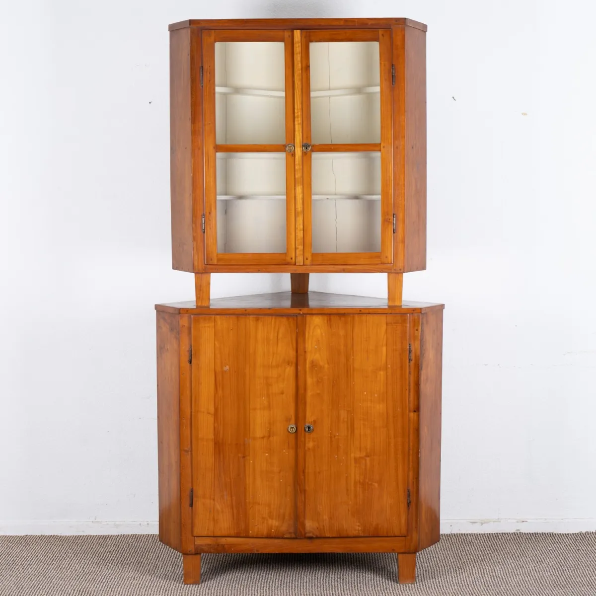 Corner display cabinet, cherry, 19th/20th c., 2-door lower section with large inner drawer and 1 shelf