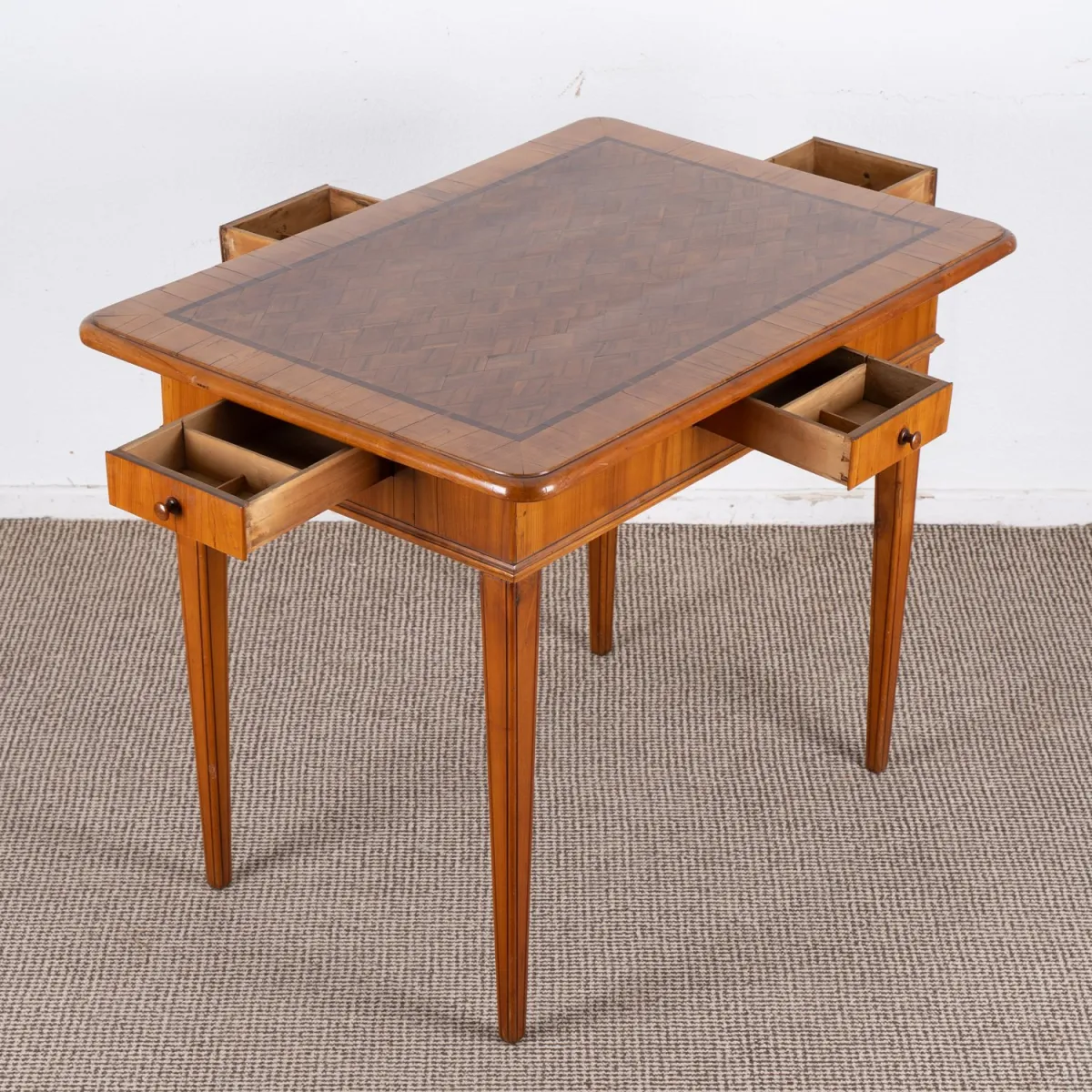 Antique gaming table, late 18th c., solid and veneered cherry, profiled slightly overhanging top