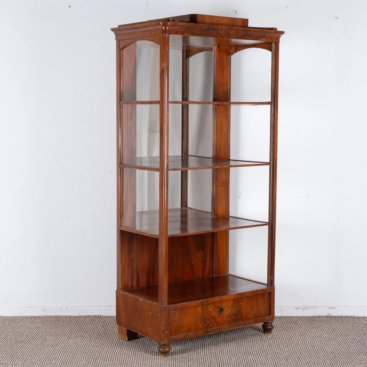 Open display cabinet, Biedermeier, North German circa 1840/50. Solid mahogany and veneered on softwood carcass. Originally…