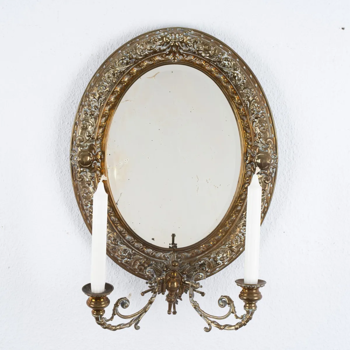 Oval wall mirror, Historicism / Gründerzeit around 1890, brass sheet, original faceted mirror glass, two single-arm