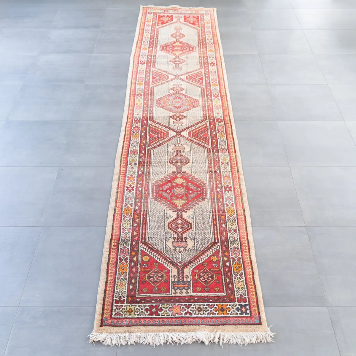 Older carpet gallery, Iran probably 1970s/80s, beige ground with partly abstract ornamentation, approx. 98 x…