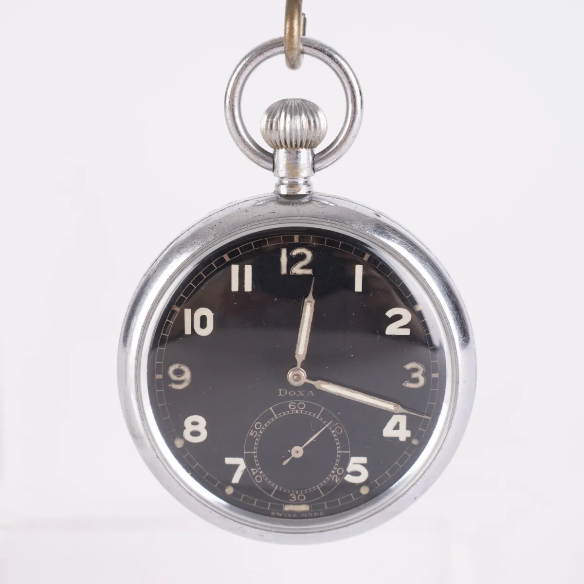 DOXA - 1940s pocket watch with fluorescent numerals and hands, steel case, mechanical hand-winding movement