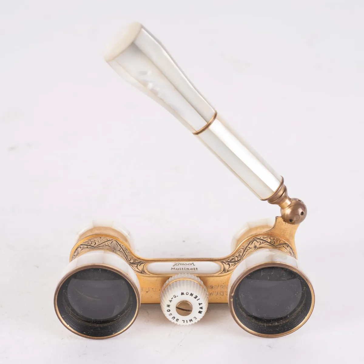 Elegant opera glasses by Busch, Multinett. Exceptionally beautiful condition, partly elaborately engraved brass housing, re…