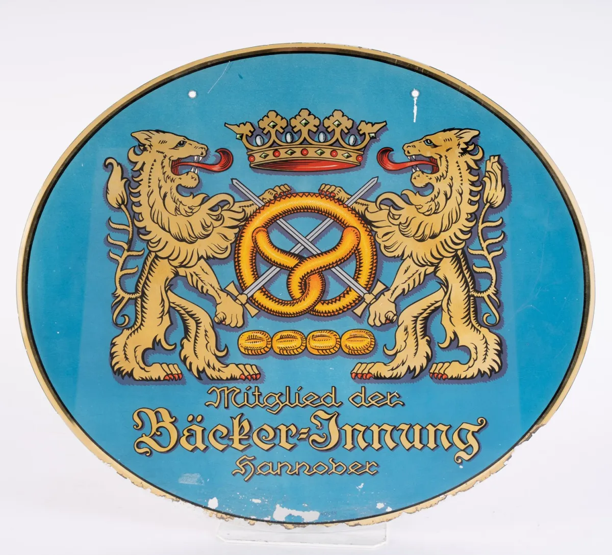 Member of the Bakers' Guild Hanover - oval clear glass sign, back covered with foil, drill holes at top center