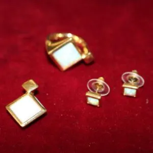 Parure de bijoux Pierre Lang, bague, boucles d'oreilles, pendentif