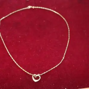 Ketting met hart hanger 333 goud, ca. 5,4 gram, lengte 46cm