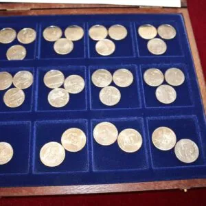 Posten Münzen, 25 US Quarter und 6 US Dollar
