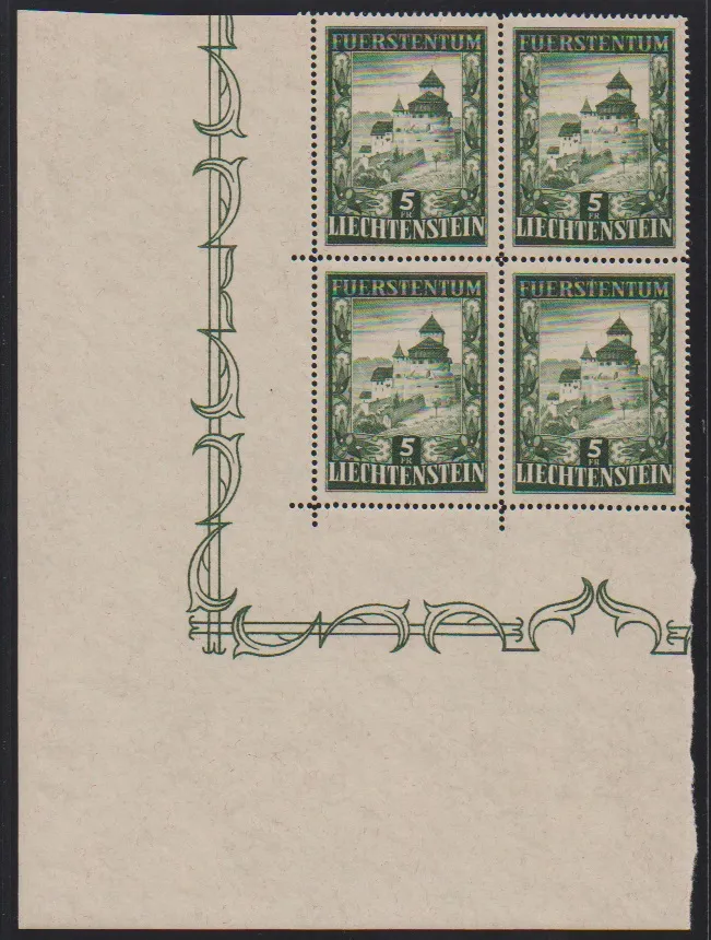 5 Fr. Vaduz Castle in mint never hinged block of four from the lower left sheet corner, hinge only in margin. Mi. 1000,- +