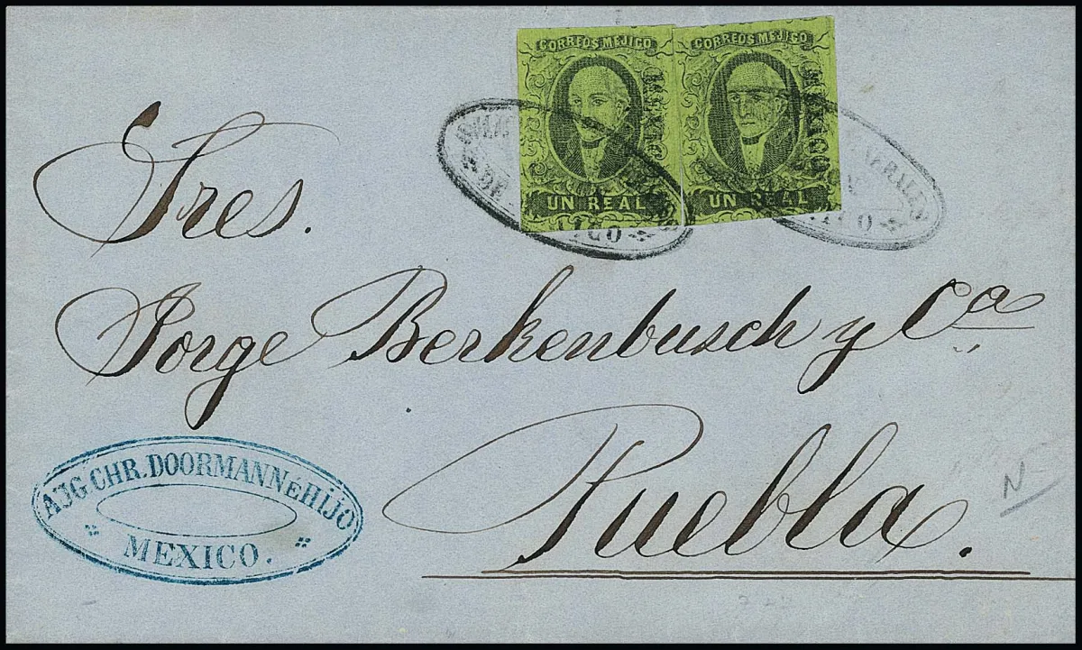1 R. zwart/groen, twee goed gesneden exemplaren met opdruk "Mexico" op postkoetsbrief van Mexico-Stad naar Puebla (10 nov. 1862), afgestempeld met ovaalstempel van de postkoetsmaatschappij "Diligencias Generales de Mexico"