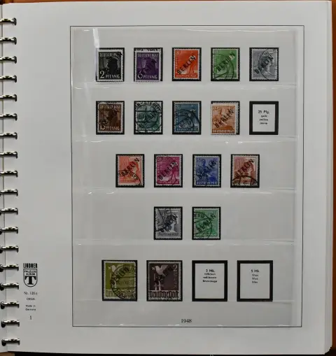 Berlin, 1948/1990, collection from the overprint values in two as-new Lindner-T pre-printed albums each with slipcase. Incl. no. 16/18, 61/63 with no. 63 PF I, all Bell sets, no. 106/109, all mentioned used etc., from 1955-1990 mint complete, and additionally from 1953-1988 used almost complete. Mi. 4700,- + albums
