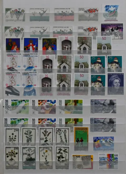 Liechtenstein, lot of the 60s/90s mint never hinged, with a multitude of complete sets, in two albums. Mi. 2400,-
