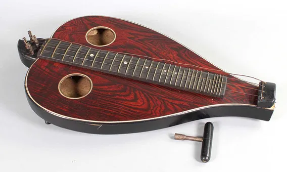 STREICHZITHER UM 1900.