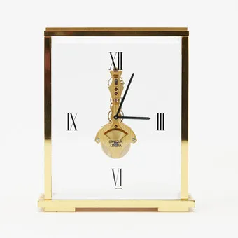 SWIZA. Table clock / alarm clock, model 'Athena', manual winding, 8-day power reserve, brass, glass, 20th century, Switzerland.