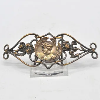 Jugendstil gesp, jongeling en rozen, brons, opengewerkt, circa 1900.