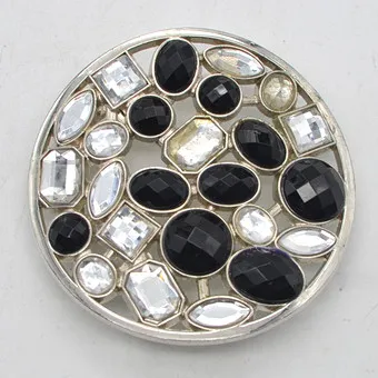 ROUND BELT BUCKLE, FACETED GLASS STONES, SILVER-PLATED SETTING, CIRCA 2000S.