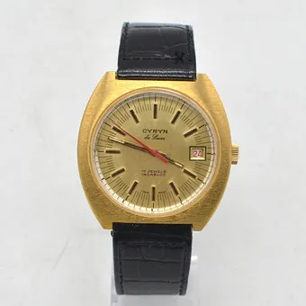 CYRYN DE LUXE, HERENHORLOGE, 17 JEWELS INCABLOC, VERGULD RVS BEHUIZING, HANDOPWINDING, DAYDATE-WEERGAVE, CA. 1960.