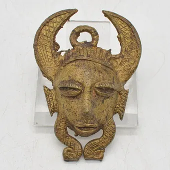 Brass pendant, African mask, handmade, 20th century, approx. 50 x 70 mm.