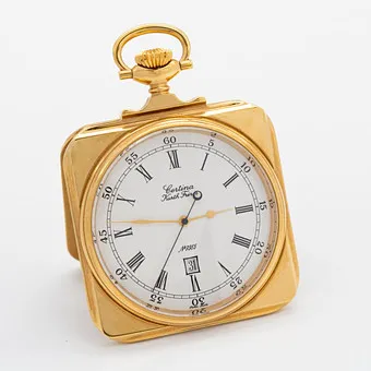 Certina (Kurth Frères) pocket and travel clock, from 1991, exclusive anniversary model for the 100th anniversary of BBC, square gold-plated case with integrated stand function, Swiss quartz movement, date display.