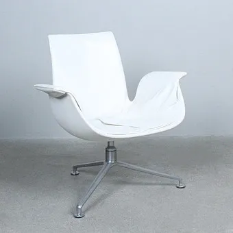 JØRGEN KASTHOLM & PREBEN FABRICIUS. Walter Knoll, fauteuil / lounge chair, model '6727 Tulip', aluminium, leer, Duitsland, jaren 1950.