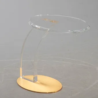Table lampe avec plateau rond, acrylique/applications métalliques dorées.