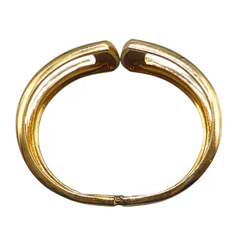 ARMREIF MIT SCHARNIER UND CROSSOVER-DESIGN.