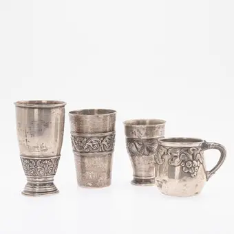 N. M. THUNE. Drie bekers en een kopje, zilver, Oslo, circa 1900/1910 (4).